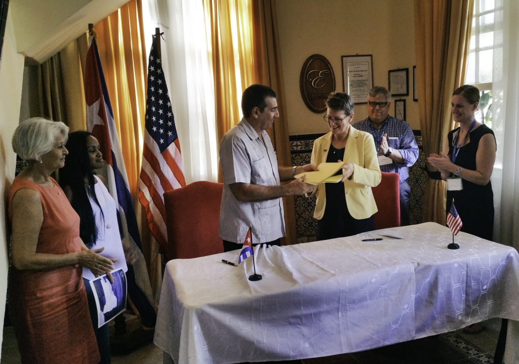 Heads of the Universities of Cienfuegos and SUNY Potsdam trade signed MOU