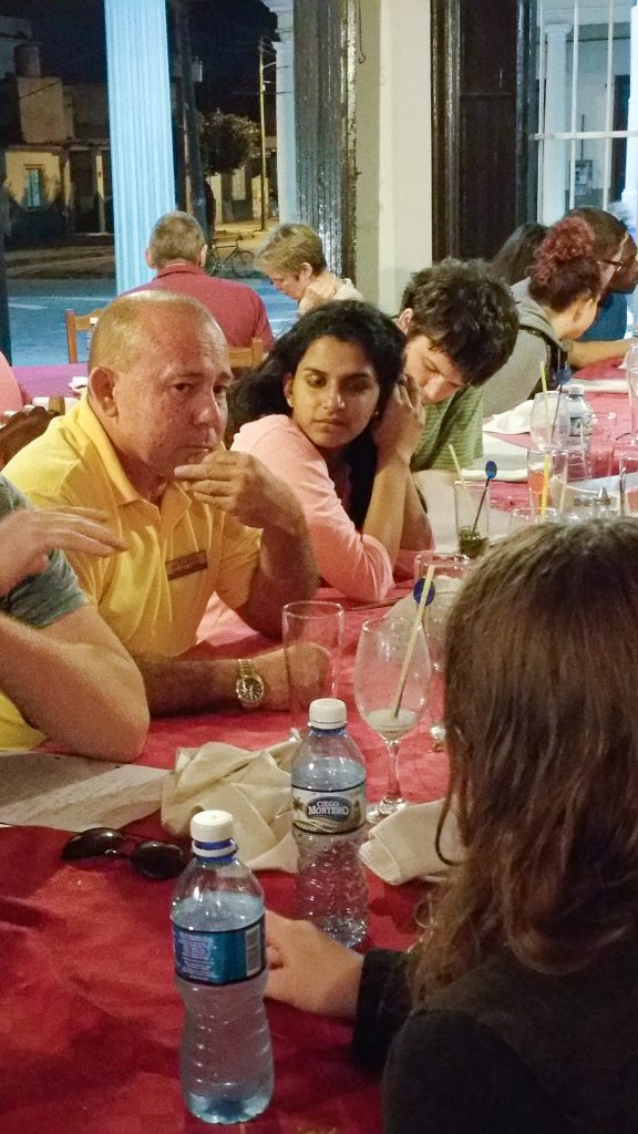 Students have dinner with Cuban entrepreneurs to learn about working as private business owners in Cuba.